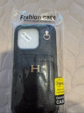 Black Leather-Look iPhone 15 Pro Case with Card Pocket and Ring
